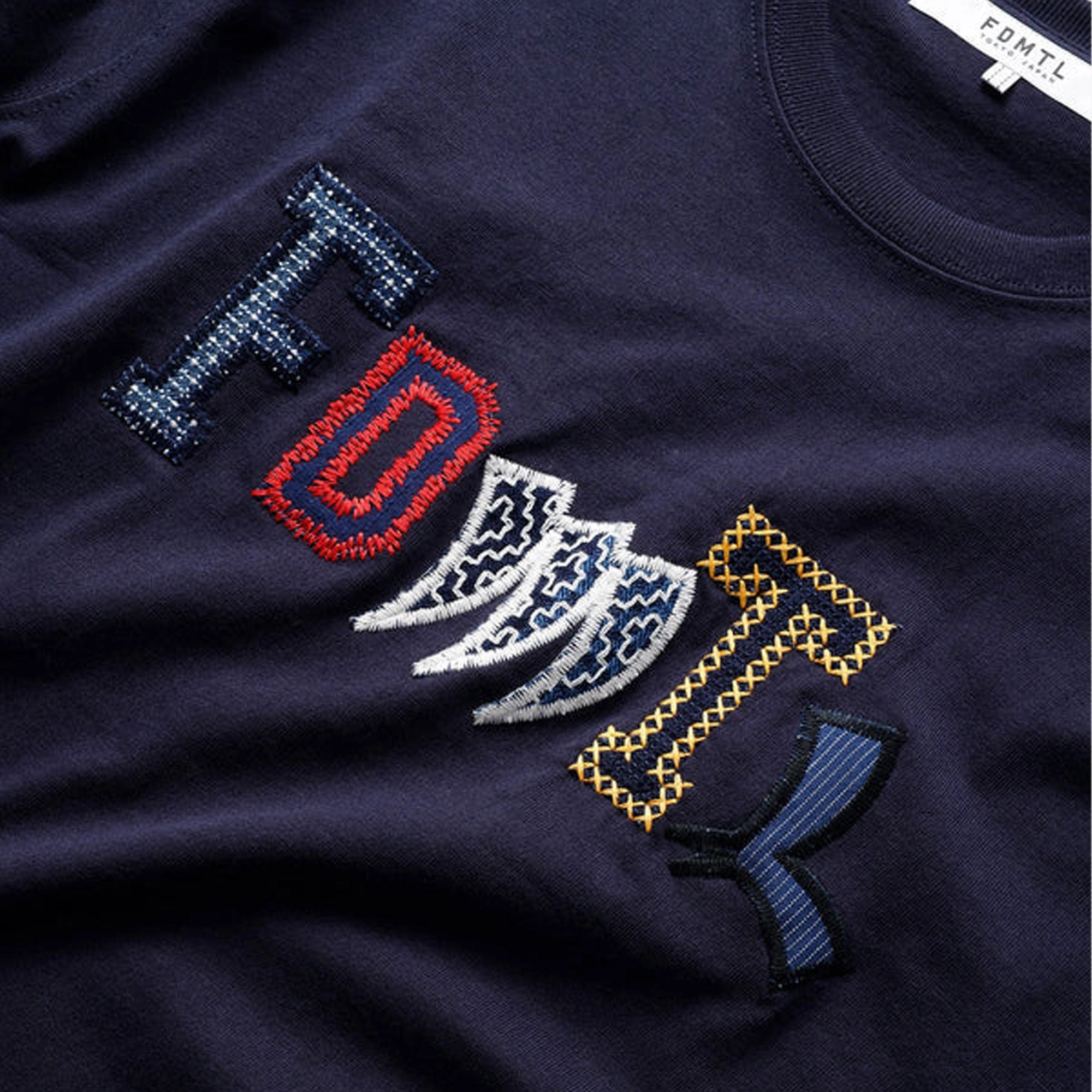 FDMTL | PATCHWORK LOGO TEE  { NAVY