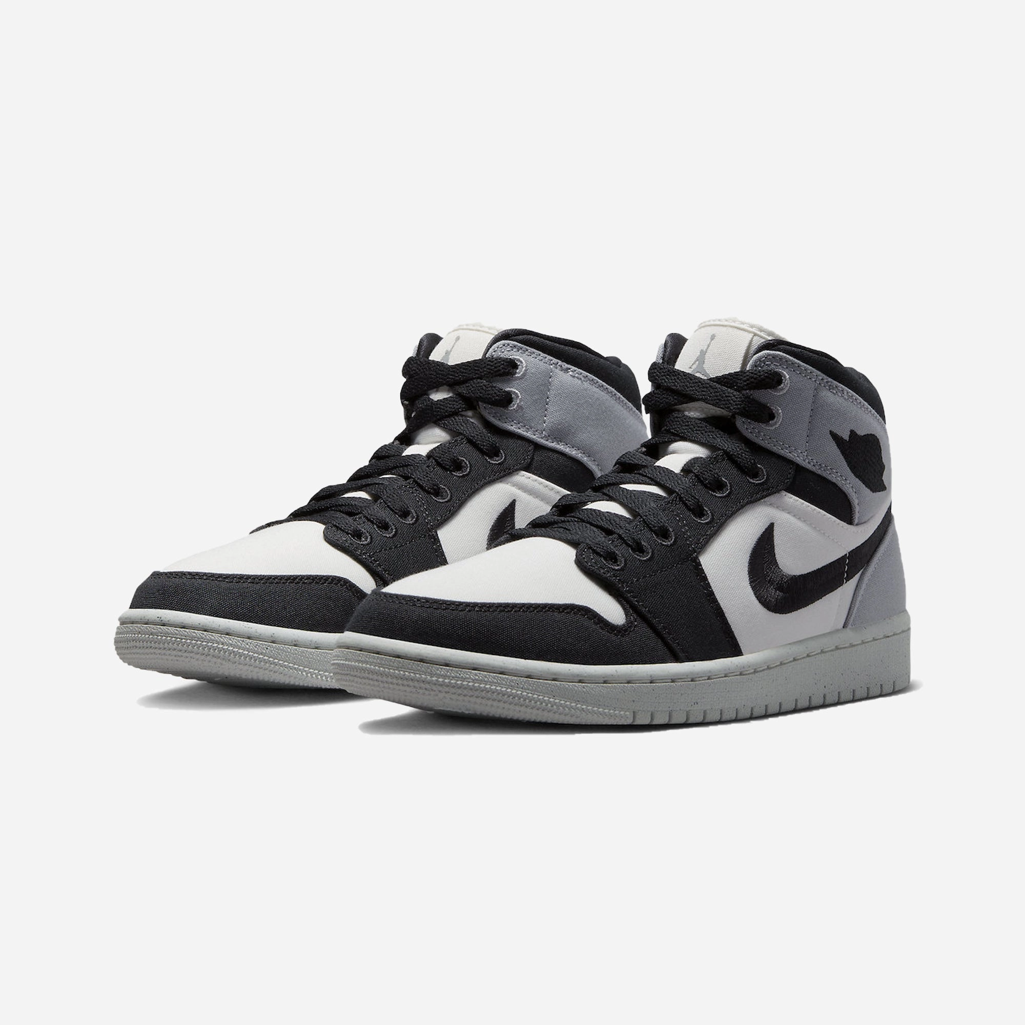 Jordan | AIR JORDAN 1 MID SE  { SAIL/BLACK-LT STEEL GREY