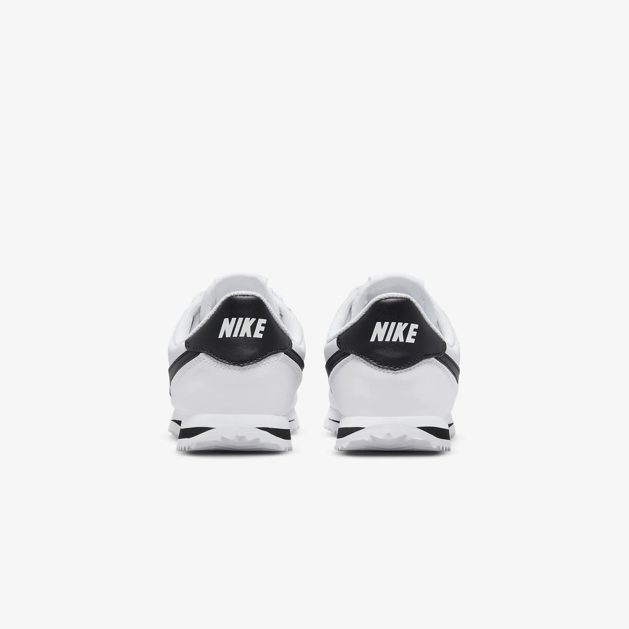 Nike | CORTEZ BASIC SL  { WHITE/BLACK
