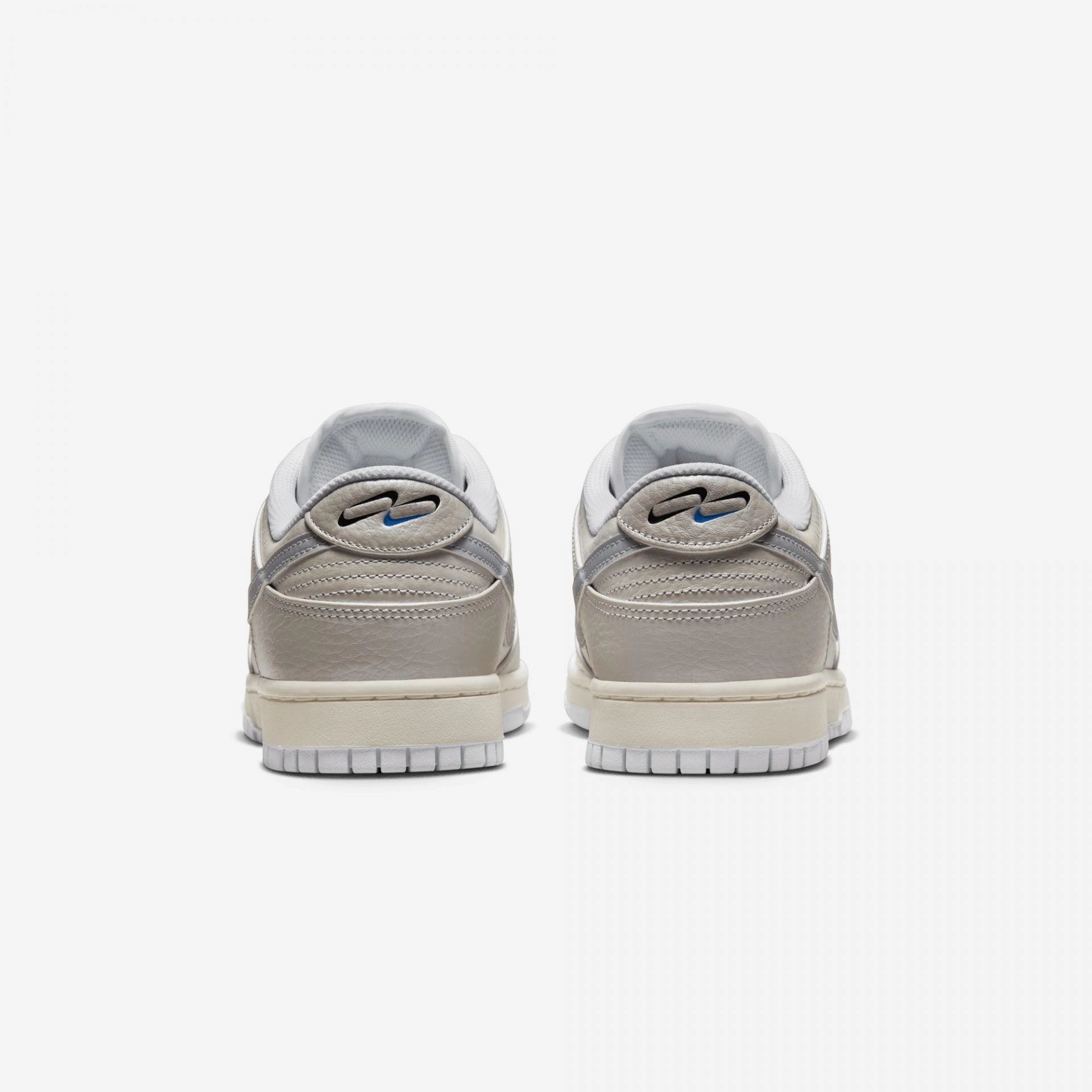 Nike | DUNK LOW  { METALLIC SILVER