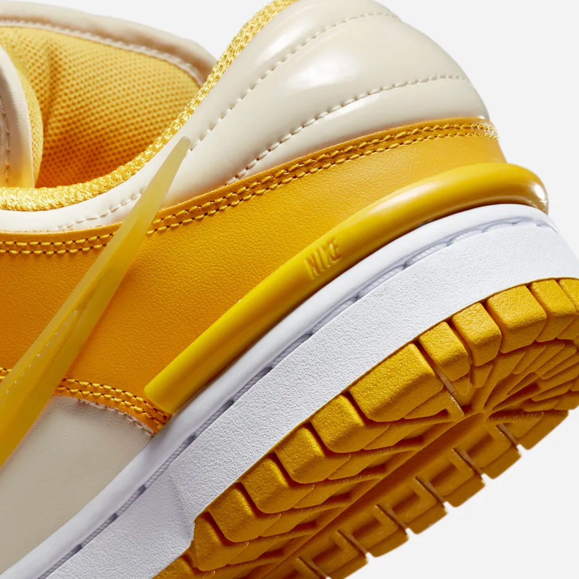 Nike | DUNK LOW TWIST  { SAIL/VIVID SULFUR-WHITE